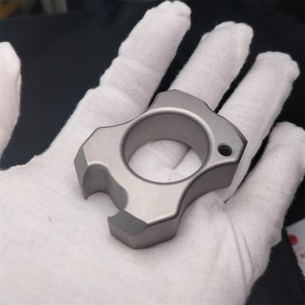 knucklebottleopeningtool_10 Authentic, Official, and Original 304 Stainless Steel Mini Knuckle Duster Multifunctional Bottle Opening Tool on Sale - Image 1